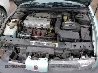 1996 Saturn SL z VIN 1G8ZH5289TZ349085, wystawiony jako Copart lot #85115354 z przebiegiem 88 352 mil mil oraz Szkoda całkowita • Salvage title. Historia ofert i sprzedaży dostępna na DreamBid. Obrazek 13.