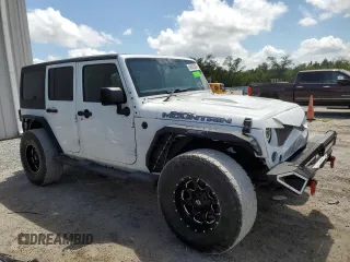 2016 Jeep Wrangler Unlimited Sport RHD with VIN 1C4BJWKG3GL266382, listed as a Copart auction lot 58852384 with 119,857 mi miles and Salvage title. Bid and sale history available at DreamBid. Image 1.