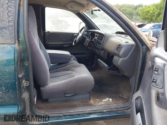 1998 Dodge Dakota SLT with VIN 1B7GL22X4WS554408, listed as a IAAI auction lot 42202021 with 147,765 mi miles. Bid and sale history available at carsss.com. Image 5.