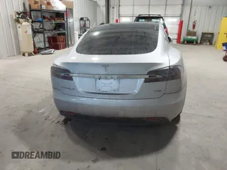 2017 Tesla Model S 100D with VIN 5YJSA1E23HF232059, listed as a IAAI auction lot 41394046 with 84,052 mi miles and . Bid and sale history available at DreamBid. Image 17.