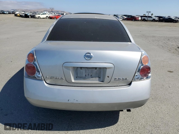 2003 Nissan Altima S z VIN 1N4AL11E23C204870, wystawiony jako Copart lot #58247635 z przebiegiem 164 420 mil mil oraz Szkoda całkowita • Salvage title. Historia ofert i sprzedaży dostępna na DreamBid. Obrazek 6.