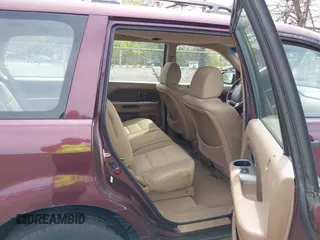 2007 Honda Pilot LX with VIN 5FNYF18107B016599, listed as a IAAI auction lot 42142933 with 186,442 mi miles and . Bid and sale history available at carsss.com. Image 8.