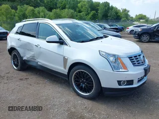 2013 Cadillac SRX Performance Collection with VIN 3GYFNHE3XDS520177, listed as a IAAI auction lot 42536457 with 217,963 mi miles and . Bid and sale history available at DreamBid. Image 1.