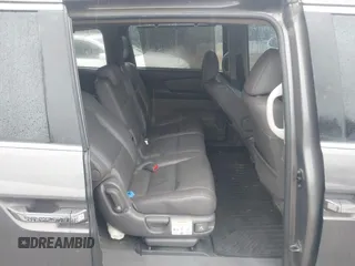 2012 Honda Odyssey EX-L with VIN 5FNRL5H6XCB057557, listed as a IAAI auction lot 42022410 with 174,286 mi miles and . Bid and sale history available at DreamBid. Image 8.