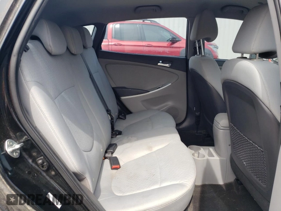2014 Hyundai Accent SE z VIN KMHCU5AE2EU164130, wystawiony jako Copart lot #50972055 z przebiegiem 113 834 mil mil oraz Szkoda całkowita • Salvage title. Historia ofert i sprzedaży dostępna na DreamBid. Obrazek 10.