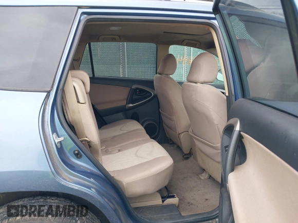 2006 Toyota RAV4 with VIN JTMBK33VX65003043, listed as a IAAI auction lot 42009844 with 294,380 mi miles. Bid and sale history available at carsss.com. Image 8.