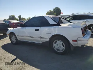 1986 Toyota MR2 z VIN JT2AW15CXG0080034, wystawiony jako Copart lot #73423944 z przebiegiem 54 316 mil mil oraz Szkody całkowita. Historia ofert i sprzedaży dostępna na DreamBid. Obrazek 2.