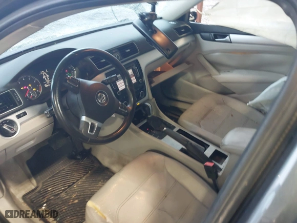 2012 Volkswagen Passat SE w/Sunroof with VIN 1VWBH7A38CC053564, listed as a IAAI auction lot 41488237 with 188,636 mi miles. Bid and sale history available at carsss.com. Image 5.