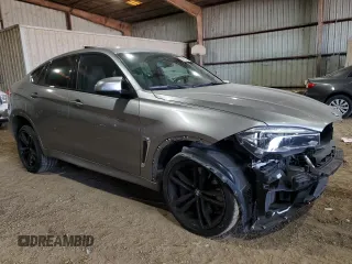 2019 BMW X6 M with VIN 5YMKW8C54KLR38377, listed as a Copart auction lot 84643024 with 47,556 mi miles and Salvage Title. Bid and sale history available at carsss.com. Image 4.