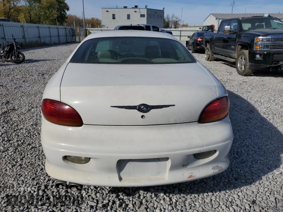 2000 Chrysler LHS z VIN 2C3HC56G4YH292405, wystawiony jako Copart lot #78263134 z przebiegiem 73 468 mil mil oraz Czysty tytuł • Clean title. Historia ofert i sprzedaży dostępna na DreamBid. Obrazek 6.