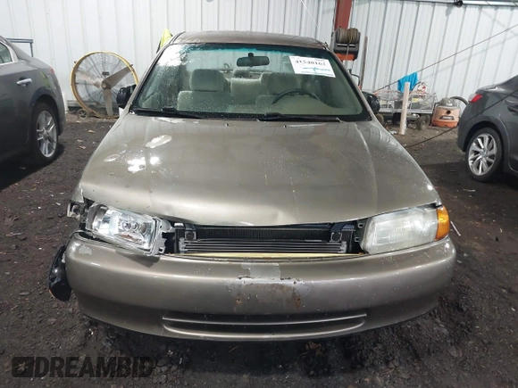 1998 Mazda Protege DX with VIN JM1BC141XW0200689, listed as a IAAI auction lot 41540162 with 172,311 mi miles and . Bid and sale history available at DreamBid. Image 12.