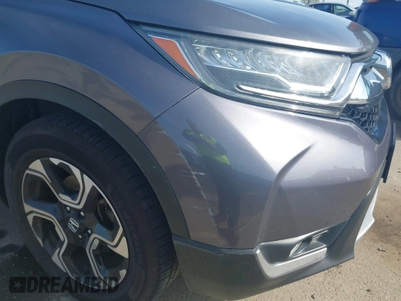 2018 Honda CR-V Touring with VIN 7FARW1H93JE027294, listed as a IAAI auction lot 41903484 with 80,999 mi miles and . Bid and sale history available at DreamBid. Image 21.