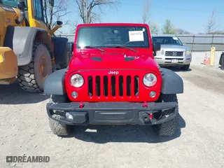 2015 Jeep Wrangler Unlimited Rubicon Hard Rock with VIN 1C4HJWFG9FL525556, listed as a IAAI auction lot 41973576 with 246,949 mi miles. Bid and sale history available at carsss.com. Image 12.