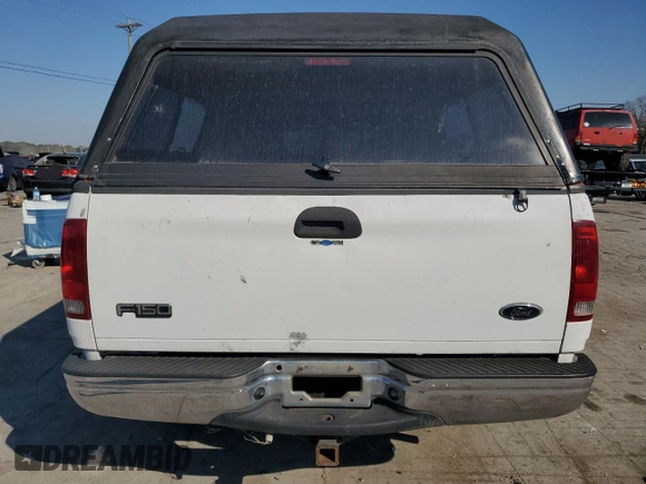 2000 Ford F-150 XL with VIN 1FTRX18W2YNC34320, listed as a Copart auction lot 77832404 with 217,448 mi miles and Clean Title. Bid and sale history available at carsss.com. Image 6.