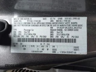2014 Ford Focus SE with VIN 1FADP3K22EL363702, listed as a IAAI auction lot 42010258 with 96,392 mi miles. Bid and sale history available at carsss.com. Image 9.