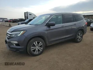 2018 Honda Pilot EX-L with VIN 5FNYF6H65JB028618, listed as a Copart auction lot 54525555 with 137,500 mi miles and Salvage title. Bid and sale history available at DreamBid. Image 1.