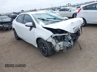 2014 Toyota Corolla L with VIN 5YFBURHE2EP085339, listed as a IAAI auction lot 42121009 with 122,339 mi miles and . Bid and sale history available at DreamBid. Image 1.