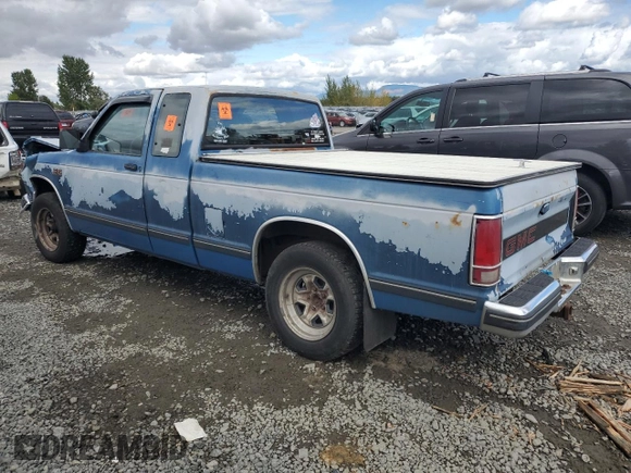 1990 GMC Sonoma z VIN 1GTCS19Z4L8502532, wystawiony jako Copart lot #71074514 z przebiegiem 148 195 mil mil oraz Szkody całkowita. Historia ofert i sprzedaży dostępna na DreamBid. Obrazek 2.