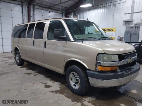 2012 Chevrolet Express Passenger 1LT with VIN 1GAZG1FAXC1127760, listed as a IAAI auction lot 41629882 with 311,110 mi miles. Bid and sale history available at carsss.com. Image 1.