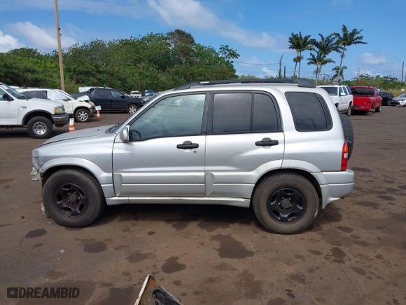 2002 Suzuki Grand Vitara with VIN JS3TE62VX24154173, listed as a IAAI auction lot 41711181 with 224,024 mi miles. Bid and sale history available at carsss.com. Image 15.