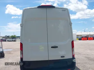 2022 Ford Transit Cargo with VIN 1FTBR3X89NKA23915, listed as a IAAI auction lot 42233534 with 3,755 mi miles and . Bid and sale history available at DreamBid. Image 16.