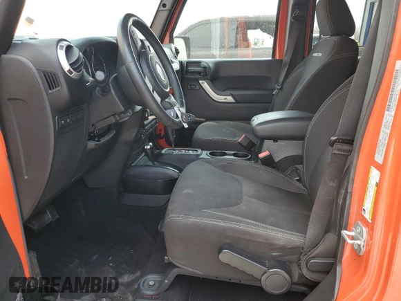 2015 Jeep Wrangler Unlimited Rubicon with VIN 1C4BJWFG9FL654550, listed as a Copart auction lot 49306965 with 64,911 mi miles and Salvage Title. Bid and sale history available at carsss.com. Image 7.