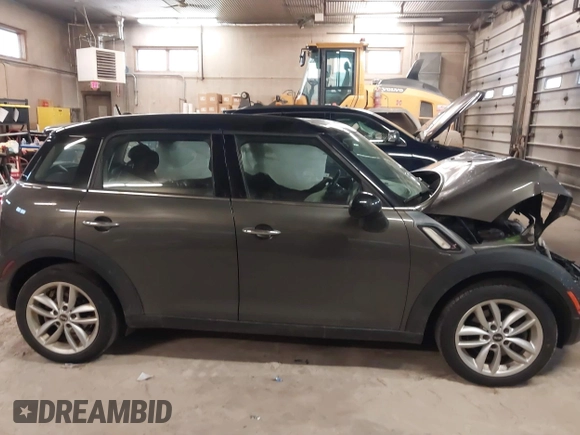 2012 MINI Countryman S with VIN WMWZC3C59CWL83491, listed as a IAAI auction lot 41791573 with 115,355 mi miles and . Bid and sale history available at DreamBid. Image 14.