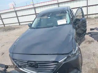 2019 Mazda CX-9 Sport with VIN JM3TCABY0K0327361, listed as a IAAI auction lot 42362232 with 264,699 mi miles and . Bid and sale history available at DreamBid. Image 12.