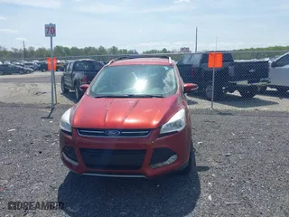 2015 Ford Escape Titanium with VIN 1FMCU0JX5FUB77475, listed as a IAAI auction lot 42103388 with 113,018 mi miles. Bid and sale history available at carsss.com. Image 12.