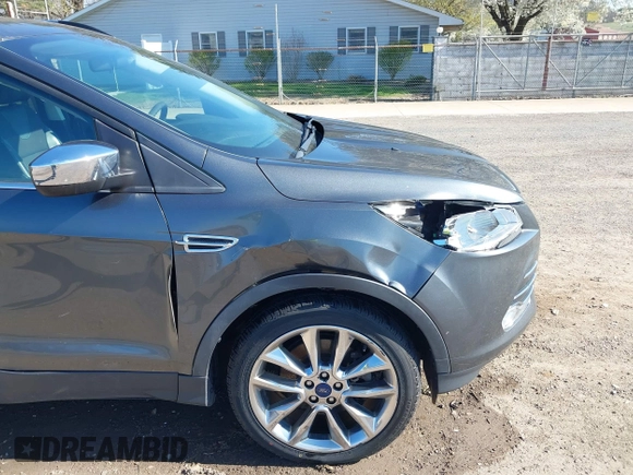 2015 Ford Escape SE with VIN 1FMCU9G97FUA89251, listed as a IAAI auction lot 41919240 with 148,472 mi miles and . Bid and sale history available at DreamBid. Image 17.