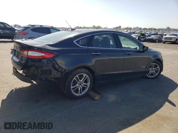 2015 Ford Fusion Energi Titanium with VIN 3FA6P0SU9FR147017, listed as a Copart auction lot 51545365 with 147,241 mi miles and Salvage Title. Bid and sale history available at carsss.com. Image 3.