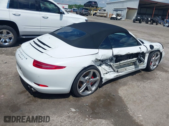 2014 Porsche 911 Carrera S z VIN WP0CB2A97ES154099, wystawiony jako IAAI lot #42264557 z przebiegiem 89 991 mil mil oraz . Historia ofert i sprzedaży dostępna na DreamBid. Obrazek 4.