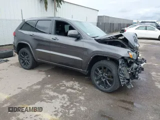 2017 Jeep Grand Cherokee Laredo with VIN 1C4RJFAG9HC885716, listed as a IAAI auction lot 41795182 with 110,613 mi miles. Bid and sale history available at carsss.com. Image 1.
