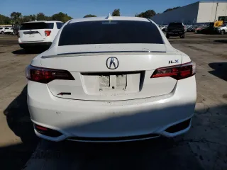 2018 Acura ILX Premium z VIN 19UDE2F84JA005193, wystawiony jako Copart lot #69123884 z przebiegiem Nie podano mil oraz Szkoda całkowita • Salvage title. Historia ofert i sprzedaży dostępna na DreamBid. Obrazek 6.