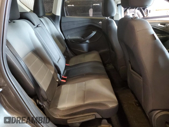 2016 Ford Escape SE z VIN 1FMCU9G99GUA67544, wystawiony jako Copart lot #57655935 z przebiegiem 156 913 mil mil oraz Nie do naprawy • Non repairable. Historia ofert i sprzedaży dostępna na DreamBid. Obrazek 10.