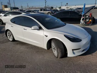 2021 Tesla Model 3 Standard Range Plus z VIN 5YJ3E1EA5MF018216, wystawiony jako Copart lot #52007385 z przebiegiem 49 711 mil mil oraz Szkoda całkowita • Salvage title. Historia ofert i sprzedaży dostępna na DreamBid. Obrazek 4.