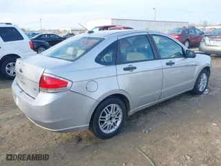 2009 Ford Focus SE with VIN 1FAHP35N39W117365, listed as a IAAI auction lot 41470640 with 229,928 mi miles. Bid and sale history available at carsss.com. Image 4.