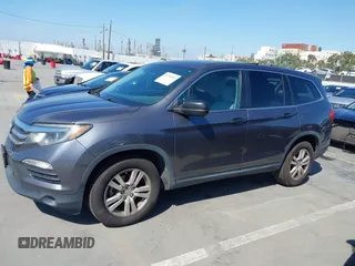 2016 Honda Pilot LX with VIN 5FNYF5H1XGB032851, listed as a IAAI auction lot 41998989 with 68,882 mi miles and . Bid and sale history available at DreamBid. Image 14.