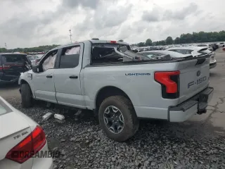 2023 Ford F-150 Lightning Pro with VIN 1FTVW1EL9PWG58758, listed as a Copart auction lot 64410814 with Not provided miles and Salvage title. Bid and sale history available at DreamBid. Image 2.