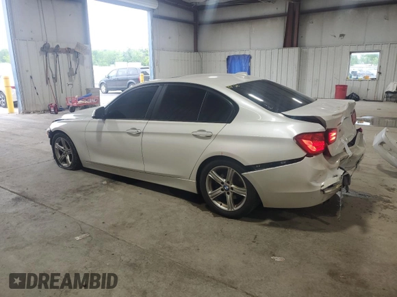 2013 BMW 3 Series 328i xDrive with VIN WBA3B3C54DF536837, listed as a Copart auction lot 62305215 with 289,839 mi miles and Salvage title. Bid and sale history available at DreamBid. Image 2.