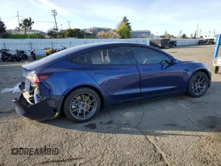 2022 Tesla Model 3 Long Range with VIN 5YJ3E1EB6NF255730, listed as a Copart auction lot 46354235 with 58,470 mi miles and Salvage Title. Bid and sale history available at DreamBid. Image 3.