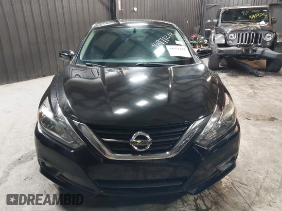2017 Nissan Altima SV with VIN 1N4AL3AP4HC239740, listed as a IAAI auction lot 41971212 with 104,823 mi miles and . Bid and sale history available at carsss.com. Image 12.