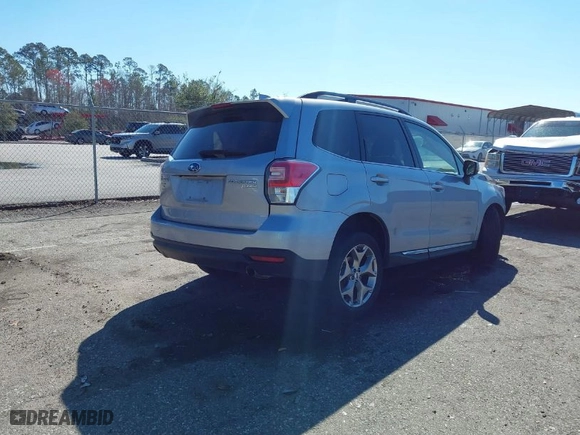 2017 Subaru Forester Touring with VIN JF2SJAWC7HH523883, listed as a IAAI auction lot 41595014 with 74,654 mi miles. Bid and sale history available at carsss.com. Image 4.