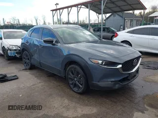 2022 Mazda CX-30 S Carbon Edition with VIN 3MVDMBCL0NM458115, listed as a IAAI auction lot 41223224 with 67,066 mi miles and . Bid and sale history available at DreamBid. Image 1.