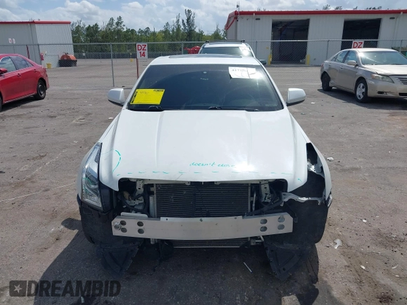 2016 Cadillac ATS Standard AWD z VIN 1G6AG5RX9G0106151, wystawiony jako IAAI lot #41710613 z przebiegiem 82 893 mil mil oraz . Historia ofert i sprzedaży dostępna na DreamBid. Obrazek 13.