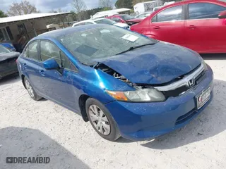 2012 Honda Civic Sdn LX with VIN 19XFB2F51CE056933, listed as a IAAI auction lot 41886402 with 126,381 mi miles. Bid and sale history available at carsss.com. Image 1.
