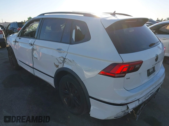 2022 Volkswagen Tiguan SE R-Line Black with VIN 3VVCB7AX1NM022655, listed as a IAAI auction lot 41319977 with 92,860 mi miles and . Bid and sale history available at DreamBid. Image 3.