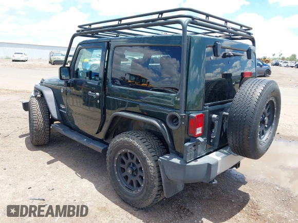 2012 Jeep Wrangler Sahara z VIN 1C4AJWBGXCL100527, wystawiony jako IAAI lot #42394623 z przebiegiem 126 097 mil mil oraz . Historia ofert i sprzedaży dostępna na DreamBid. Obrazek 3.
