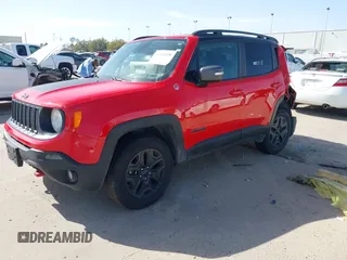 2018 Jeep Renegade Trailhawk with VIN ZACCJBCB9JPH37406, listed as a IAAI auction lot 41822630 with 57,711 mi miles and . Bid and sale history available at DreamBid. Image 2.