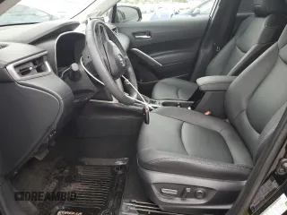 2024 Toyota Corolla Cross XLE with VIN 7MUDAAAG8RV095021, listed as a Copart auction lot 59232265 with 7,010 mi miles and Salvage title. Bid and sale history available at DreamBid. Image 7.